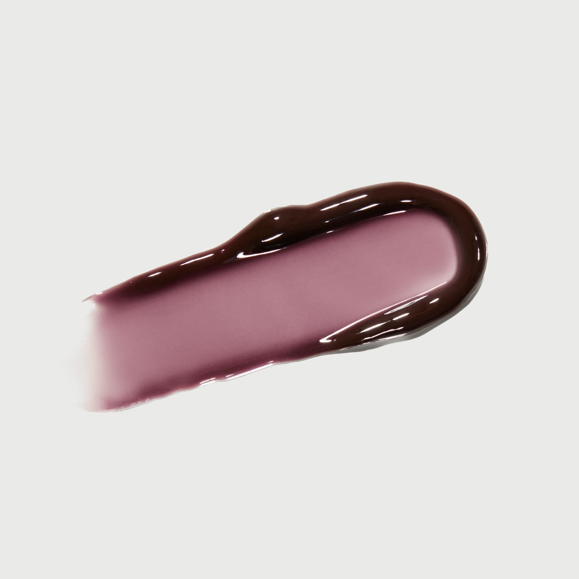 phyto-glow-lip-balm-midnight-z3 NATR-10118-Swatch-Phyto-Glow-Midnight-bonebkgd.jpg
