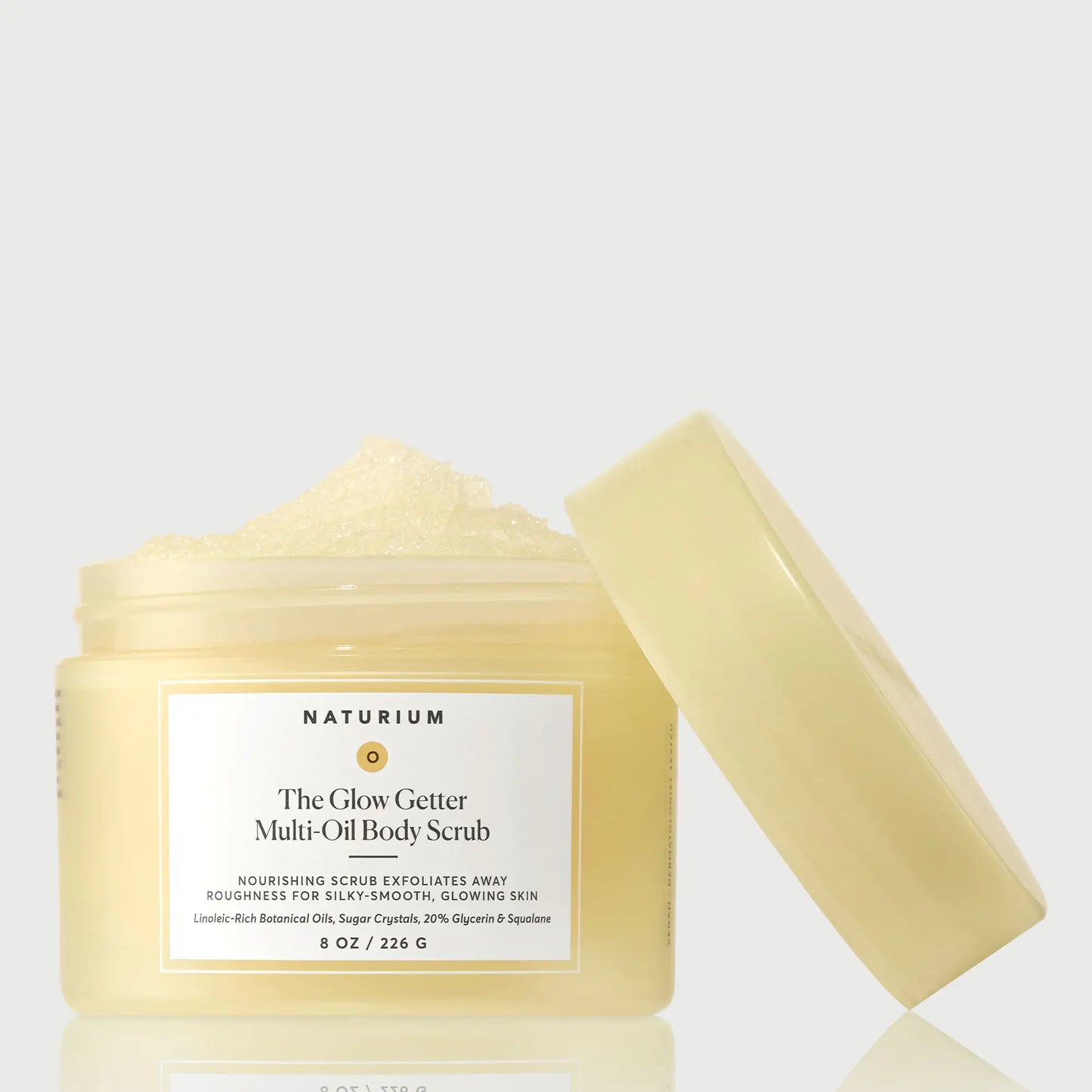 the-glow-getter-multi-oil-body-scrub-f7 NATR-40028-GlowGetter-Multi-Oil-Body-Scrub-Front-CapOff-bonebkgd.webp