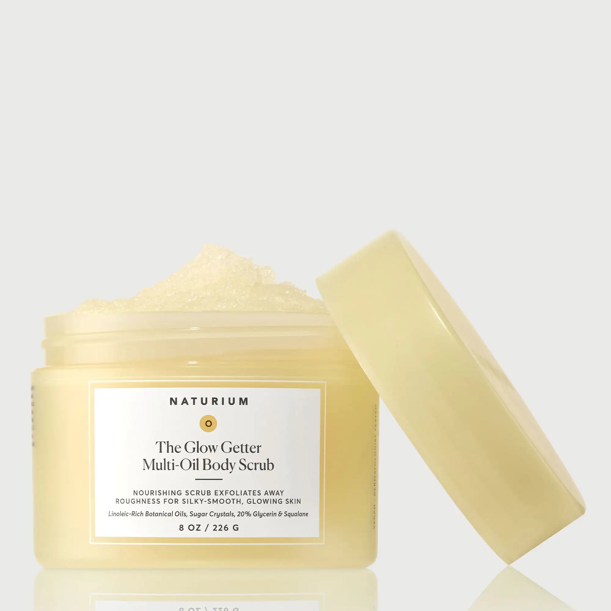 the-glow-getter-multi-oil-body-scrub-f7 NATR-40028-GlowGetter-Multi-Oil-Body-Scrub-Front-CapOff-bonebkgd.webp