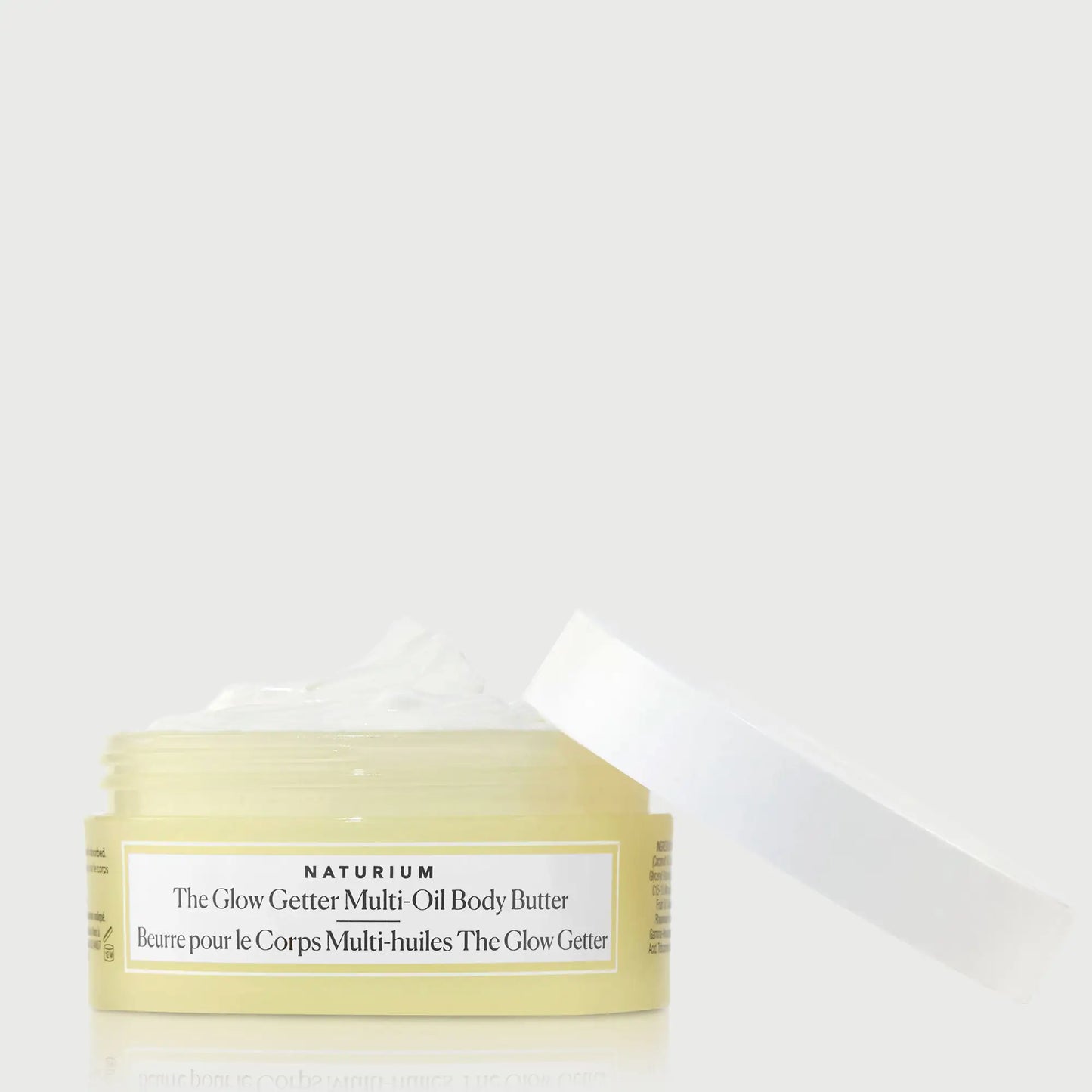 the-glow-getter-multi-oil-body-butter-travel-size-e3 NATR-40115_Glow-Getter-Body-Butter-Mini_front_capoff_bonebkgd.webp