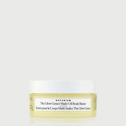 the-glow-getter-multi-oil-body-butter-travel-size-e3 NATR-40115_Glow-Getter-Body-Butter-Mini_front_capon_bonebkgd.webp