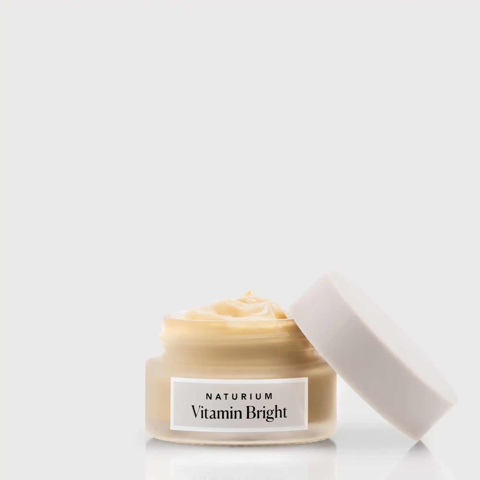 vitamin-bright-illuminating-eye-cream-v5 NATR-VitaminBright_LIGHT_Primary_front_openjar_bone.webp