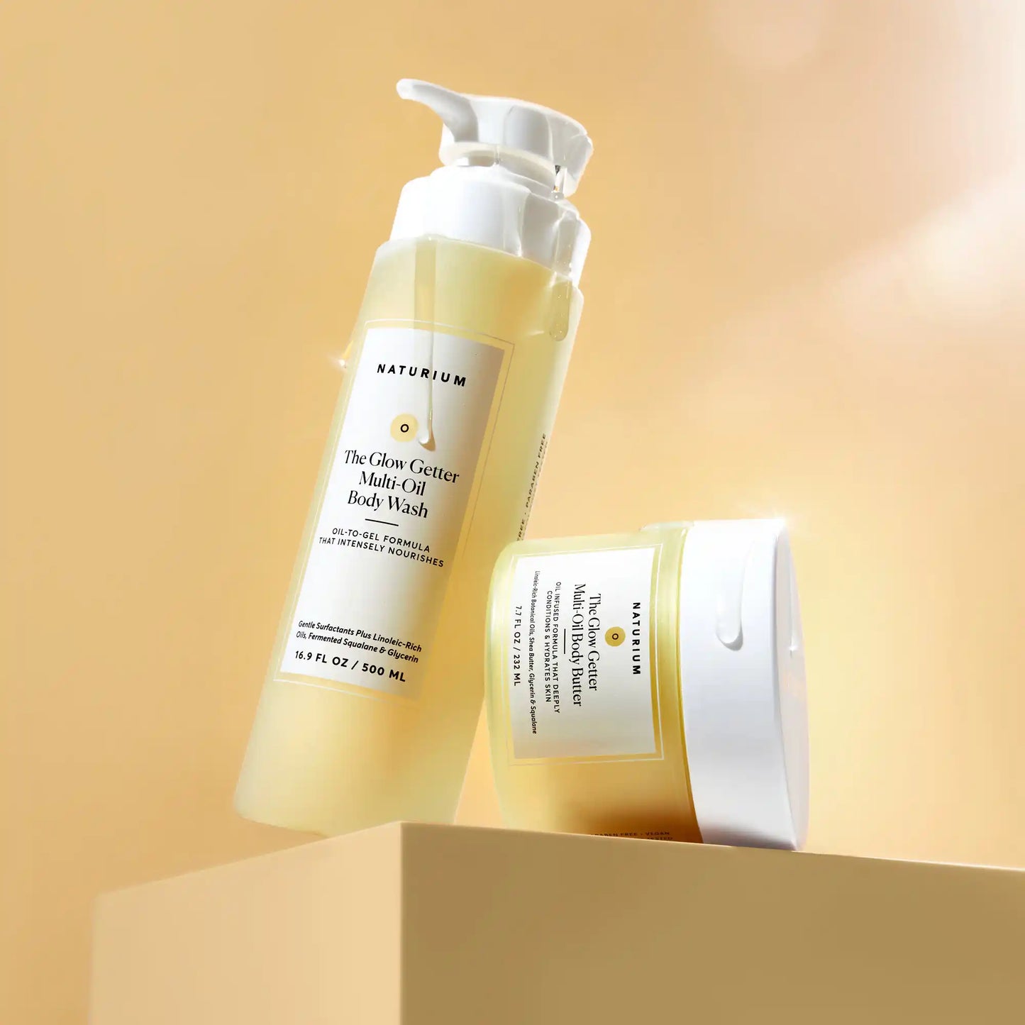 the-glow-all-out-body-bundle-a5 gg-bodybutter_1464-crop_revcolor_FL.webp